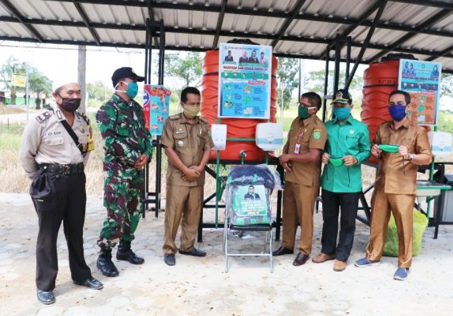DPRD Kutim Serahkan Bantuan Tandon dan Masker di Ranpul